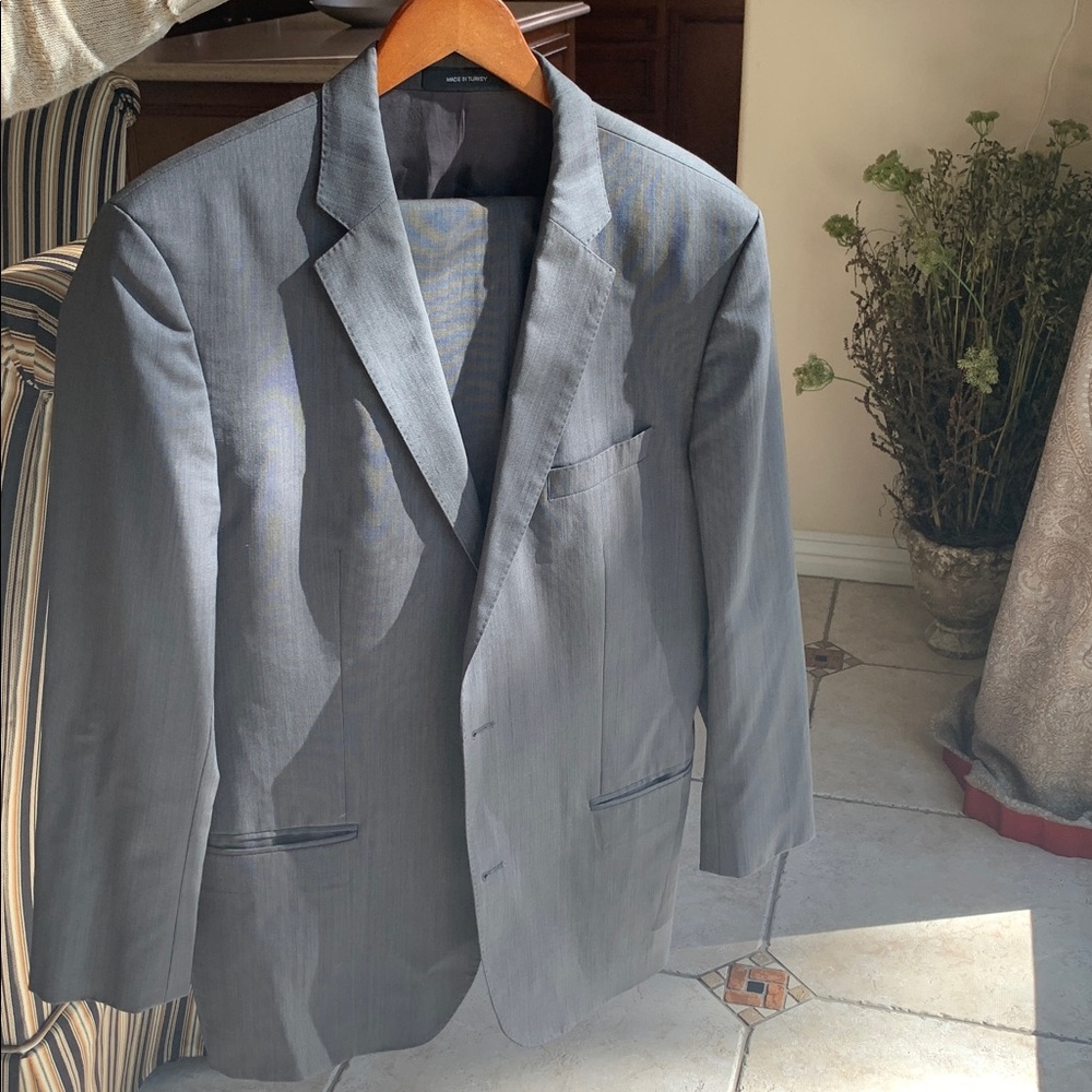 Hugo Boss , Jam Sharp Model. One of a kind gun metal grey color.